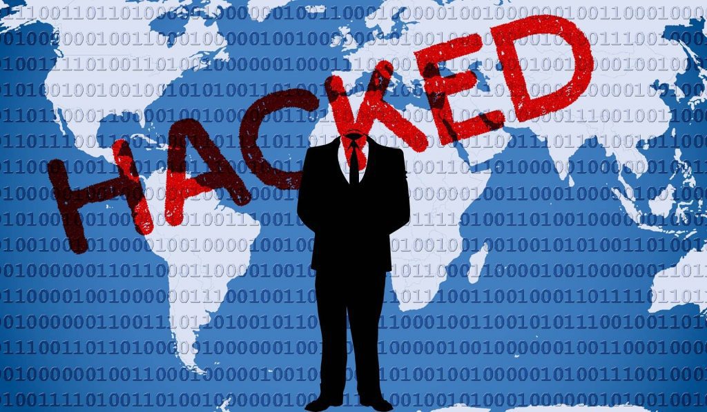World map with man and hacked in red